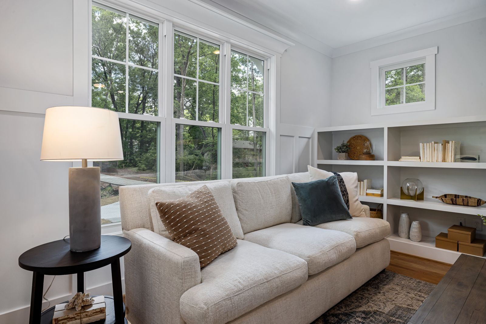 Linen sofa and warm wood living room